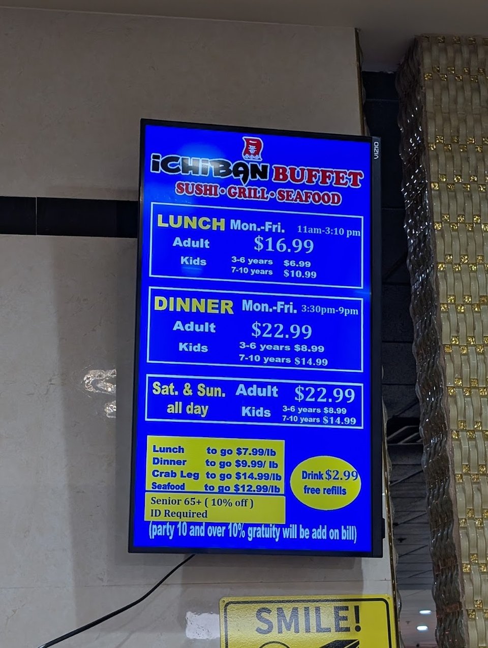 Printed menu showing adult and kids buffet options.